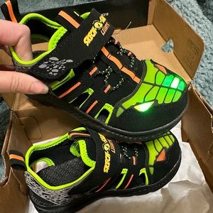 Sketchers light up dinosaur shoes